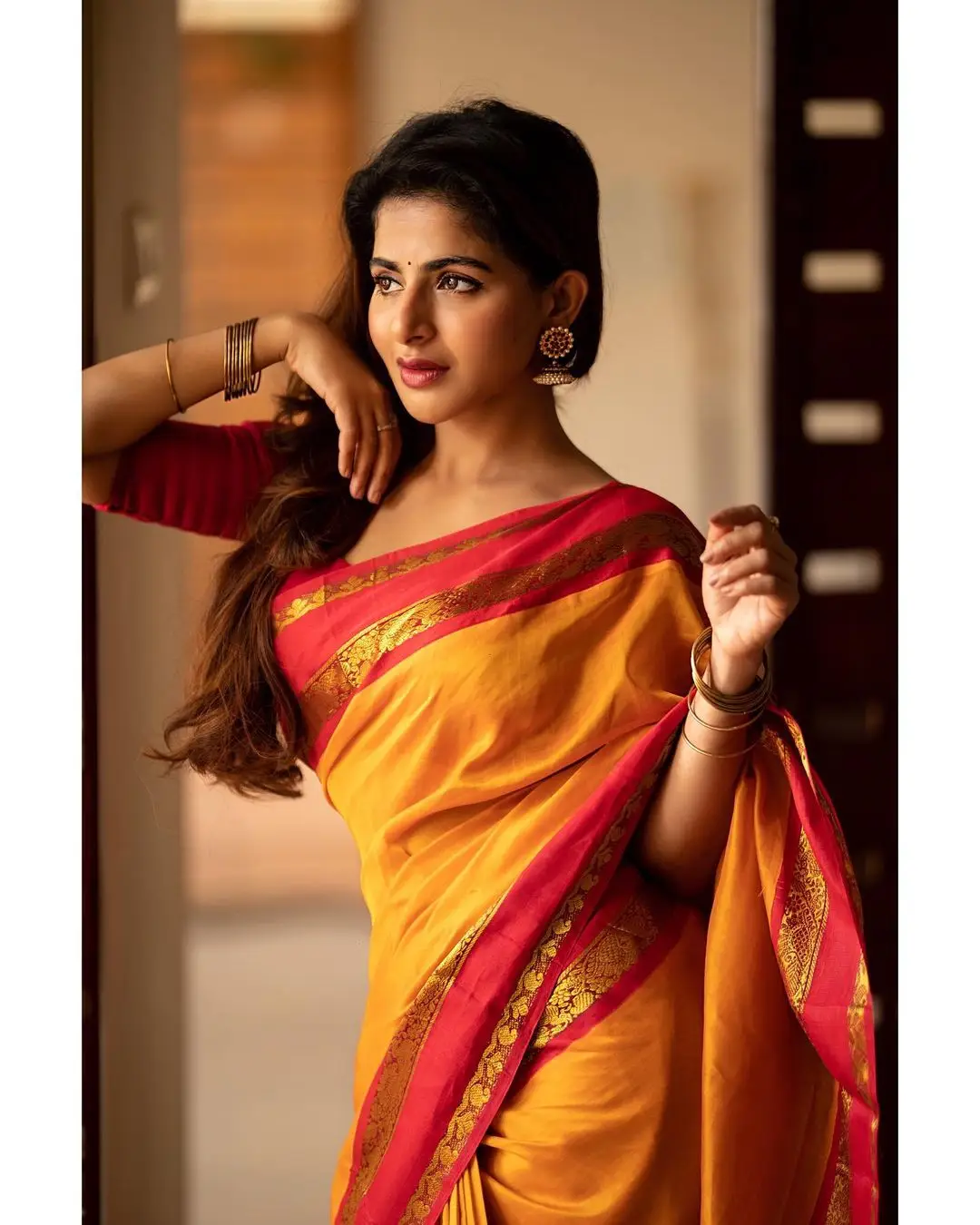 Indian Girl Iswarya Menon In Traditional Orange Saree Sleeveless Blouse